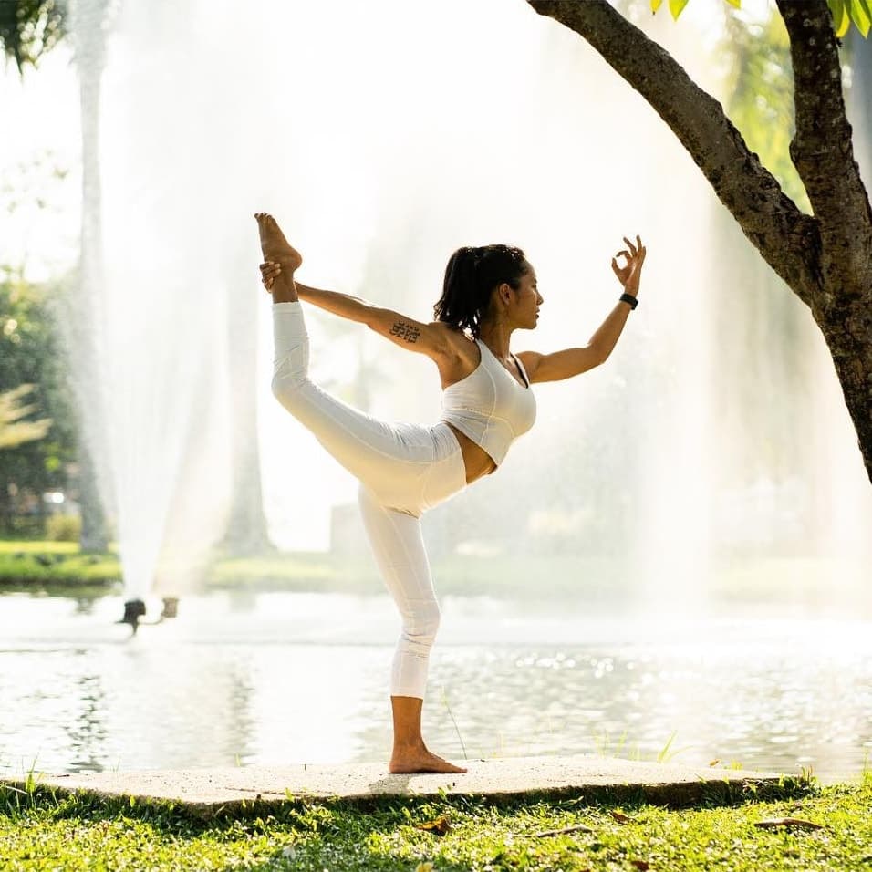 Nicha in the park in Chiang Mai — the yoga teacher who sews these pieces