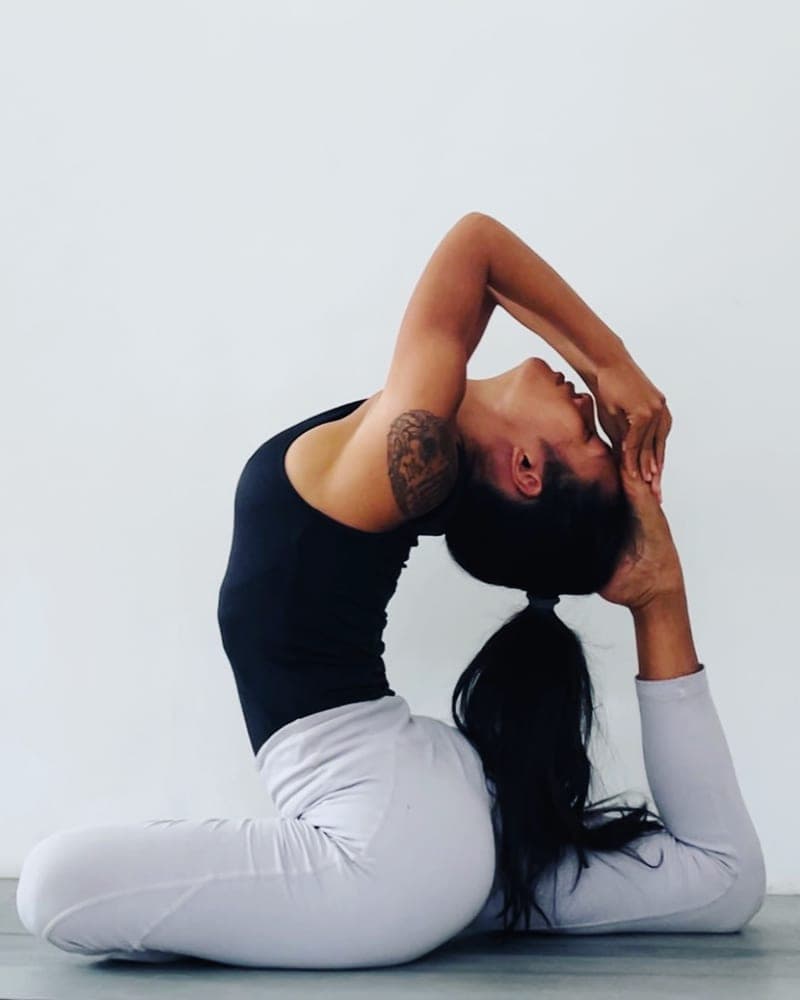 Nicha in king pigeon pose — private yoga class in Chiang Mai